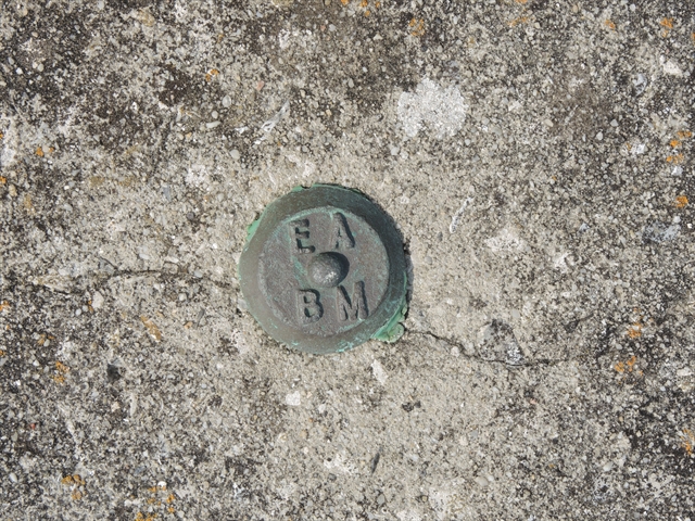 Environment Agency on Coastal wall, Chiswell